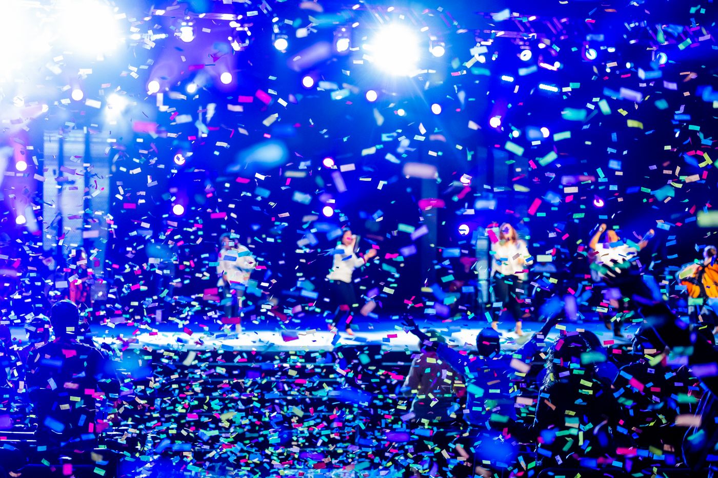 Concert audience beneath a shower of confetti